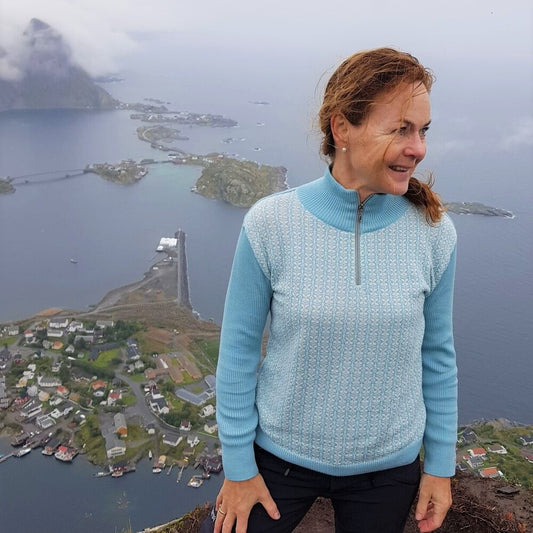 SNØROSE ULLGENSER MED GLIDELÅS, TURKIS/ NATURHVIT