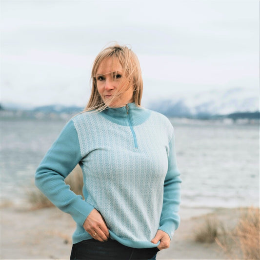 SNØROSE ULLGENSER MED GLIDELÅS, TURKIS/ NATURHVIT